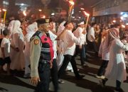 Polri Untuk Masyarakat, Polres Purwakarta Lakukan Pengamanan Pawai Obor 1 Muharam
