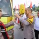 Polres Tulang Bawang Bagikan Ratusan Bendera Merah Putih Gratis Sambut HUT RI Ke-80