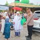 Polsek Kandis Tebar Kepedulian Lingkungan, Bagikan 100 Bibit Pohon Usai Sholat Idul Fitri 1447 H