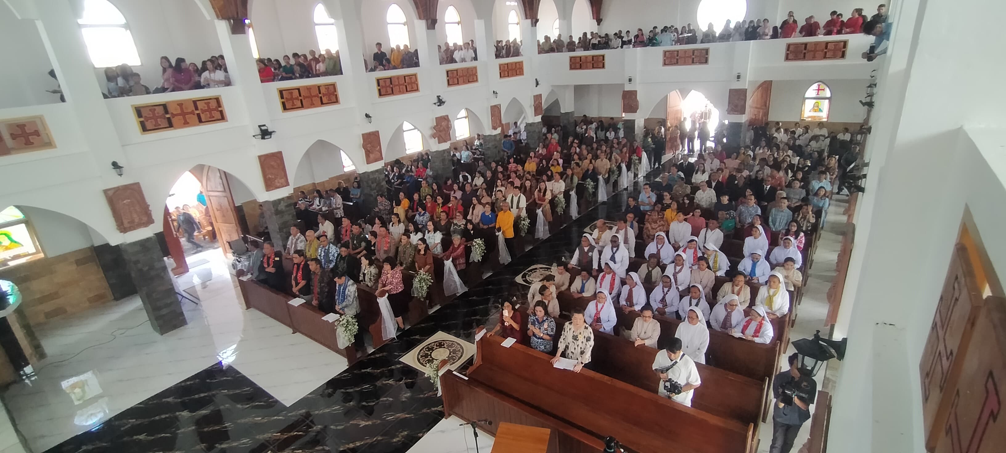 peresmian gereja paroki santa rosa de lima tondano berlangsung khidmat dan semarak, kodim 1302/minahasa menyalurkan bantuan sosial kepada umat beriman 2 IMG 20260705 WA0029