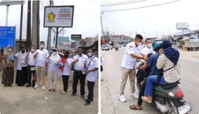 Peduli Kesehatan Masyarakat, Kader Gerindra PAC Kandis Bagikan 1000 Masker di Simpang Belutu Kandis Akibat Polusi Asap Karhutla